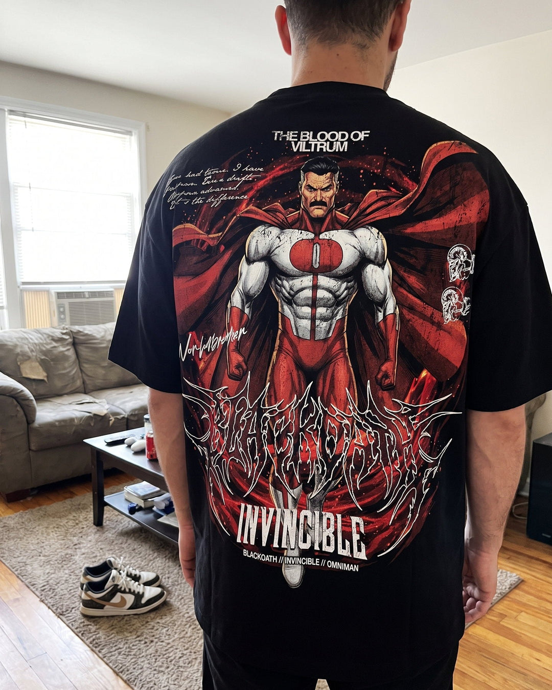 Blood of Viltrum Tee — back print, worn at home