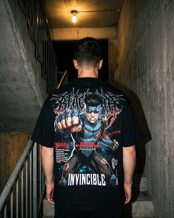 Still Standing Tee — Mark Grayson full-back print, worn